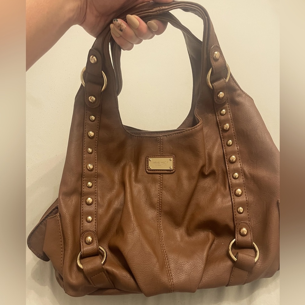 Brown studded Nine West purse with tons of storage space!